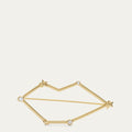 Gold lip shaped constellation brooch with star design on a white background