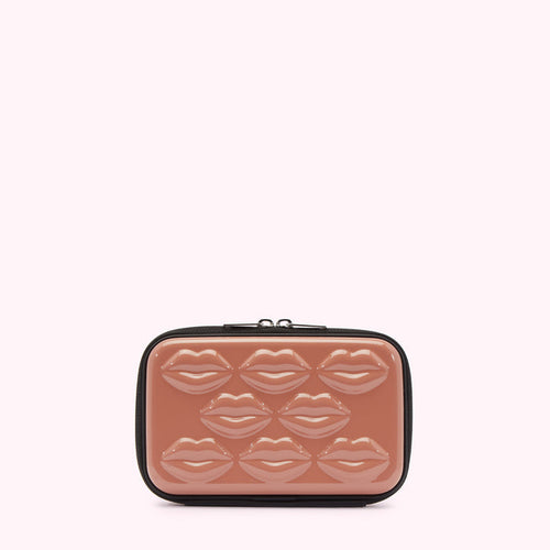 Dusty rose cosmetic bag with a black zipper and lips moulded into the case.