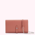 Dusty rose leather wallet with a detachable chain strap.
