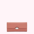 Dusty rose leather wallet with silver lip clasp, on a white background.