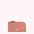 Dusty rose leather zip-around cardholder with silver lip logo.