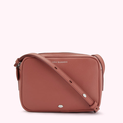 Dusty rose Lulu Guinness crossbody bag with silver-toned hardware.