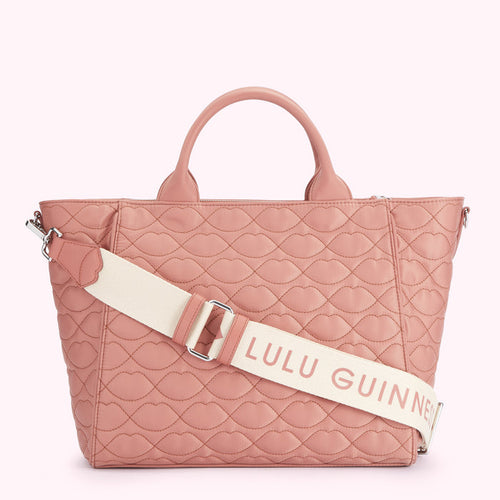 Dusty rose quilted tote bag with a cream Lulu Guinness strap.