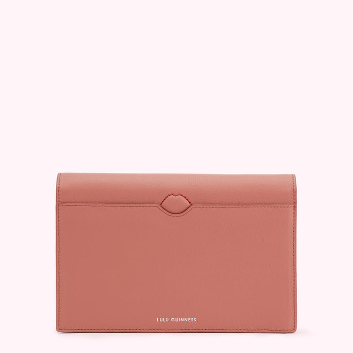 Dusty rose Lulu Guinness wallet with red lips detail.