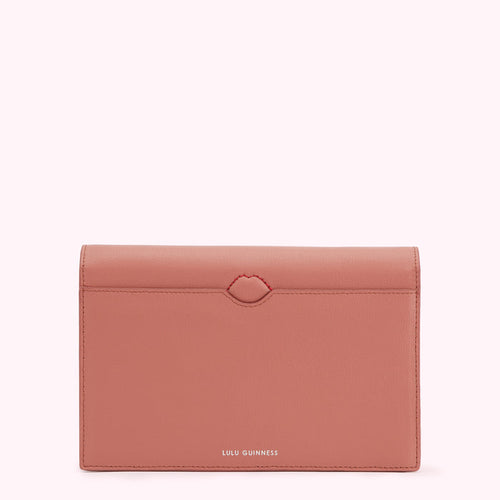 Dusty rose Lulu Guinness wallet with red lips detail.