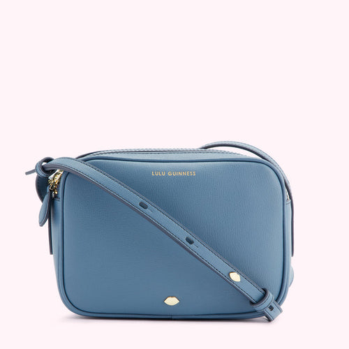 Dusty blue Lulu Guinness crossbody bag.
