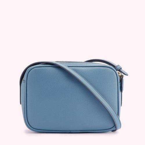 Dusty blue leather crossbody bag with gold zipper.