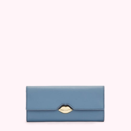 Dusty blue leather wallet with gold lip-shaped clasp against a white background.