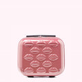Pink rolling suitcase decorated with lip print.