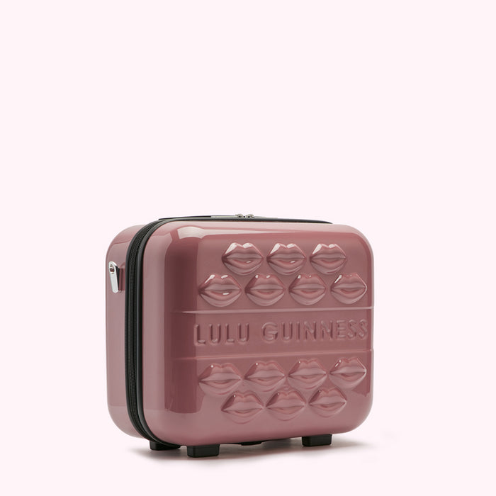 Pink Lulu Guinness makeup case with lips design.