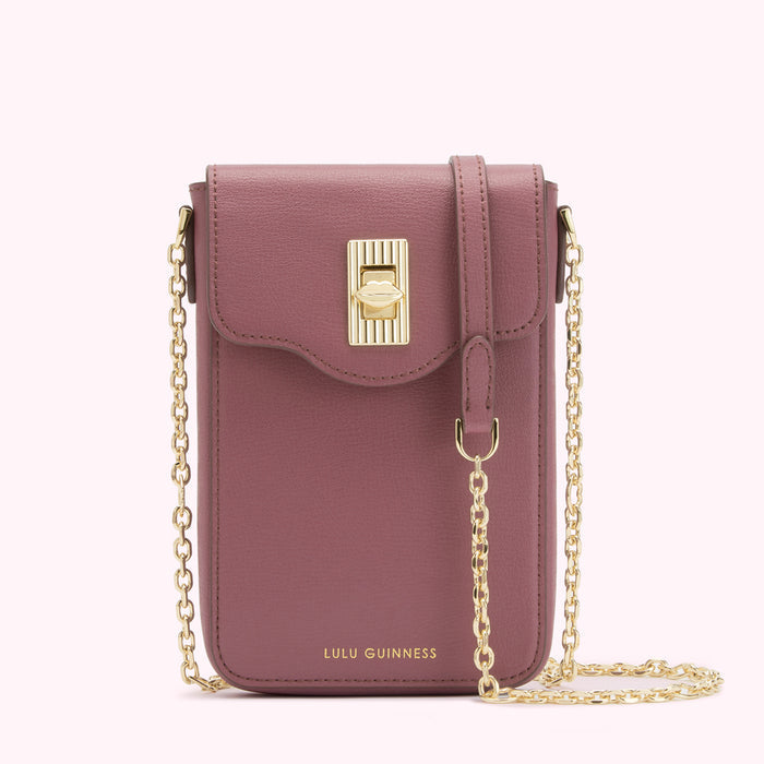 A mauve leather crossbody bag with a gold chain strap and a gold lip-shaped clasp. The bag has the Lulu Guinness logo on the front. The background is white.