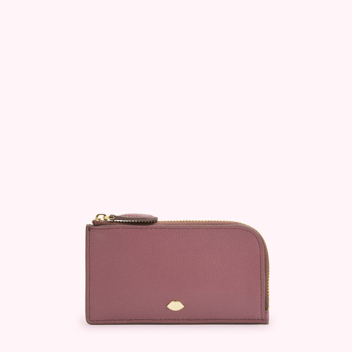 Dusty rose leather zip-around cardholder with gold zipper and logo.