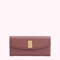 Dusty rose leather wallet with gold clasp.