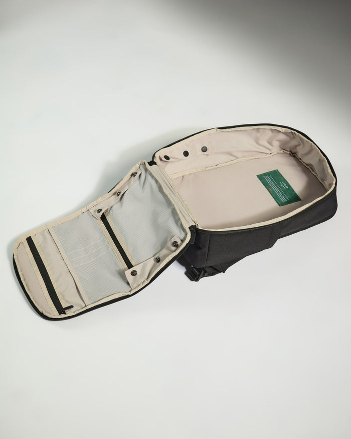a black bag with a green label