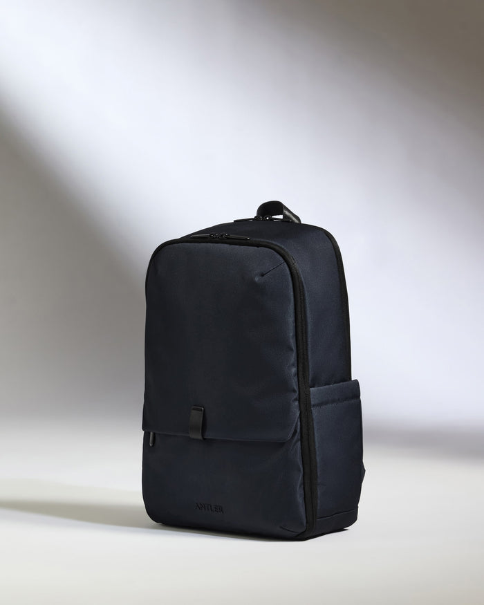 a black backpack on a white background