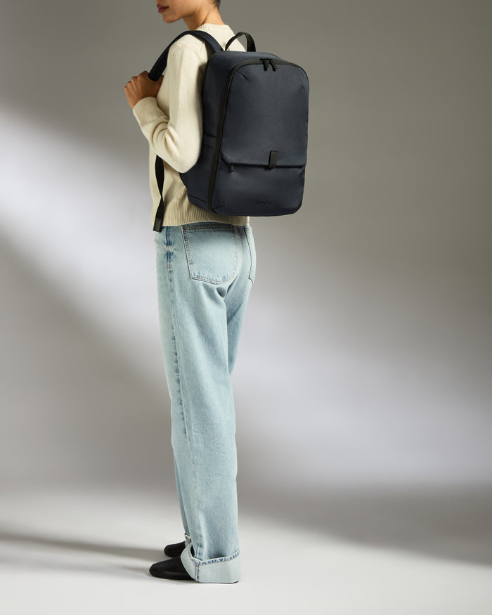 a woman with a backpack