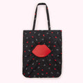 Black tote bag with red lips print and a large red lip-shaped detail.