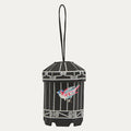 Black birdcage-shaped bag with embroidered bird.