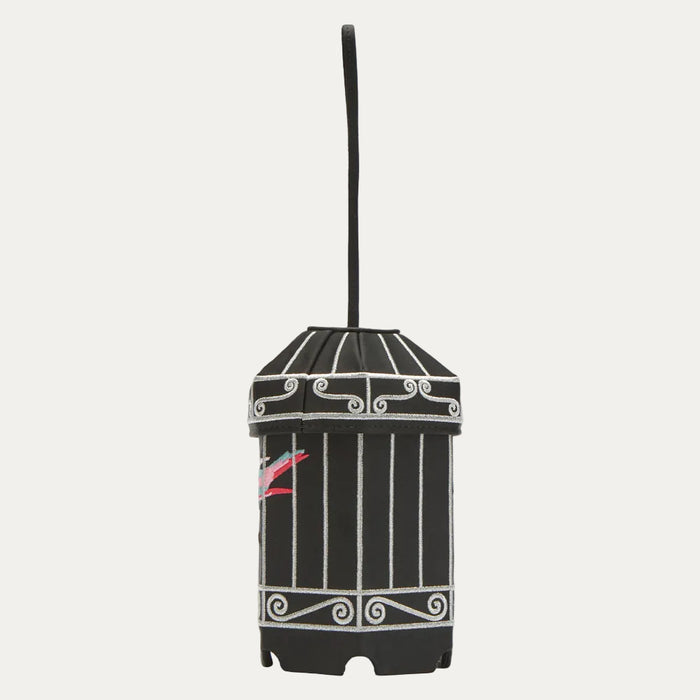 Black birdcage-shaped bag with silver detailing and a small embroidered bird.