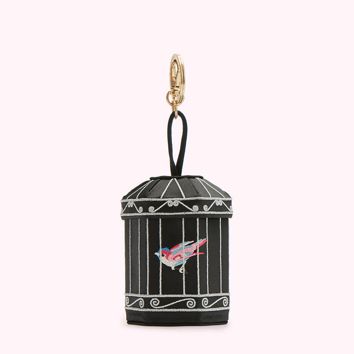 Black birdcage-shaped keychain with a gold clasp and a small embroidered bird inside.