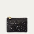 Black satin pouch with star constellation design and 'LULU' branding on a light gray background