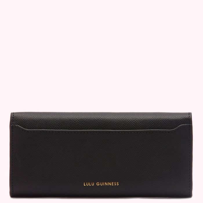 Black Lulu Guinness wallet on white background.