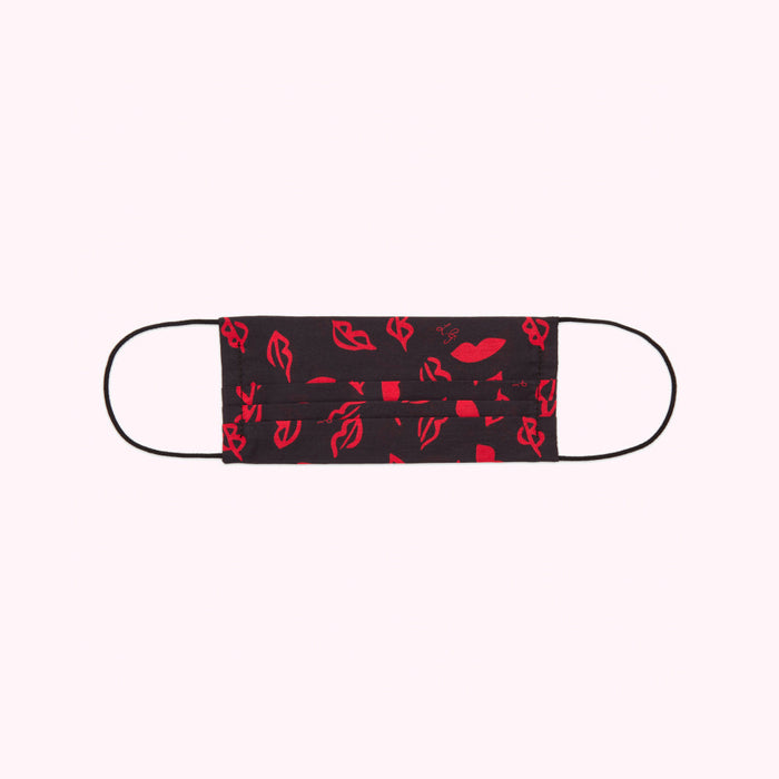 Black face mask with a red lip print.