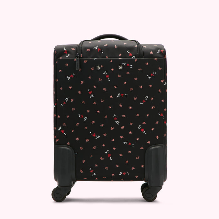 Black carry-on suitcase with a repeating pattern of red lips and "I love Lulu" text on a black background.