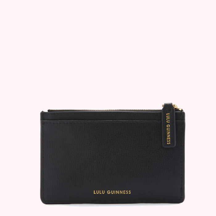 Black Lulu Guinness cardholder with gold zipper and logo.