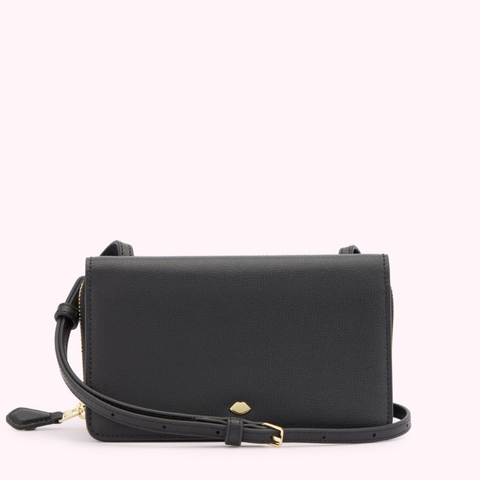 Front image of a black leather crossbody bag with a gold metal zip, buckle and lip shaped detail.