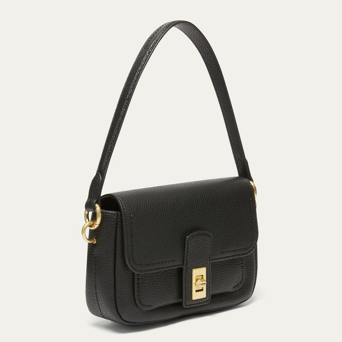 A black pebbled leather shoulder bag with a structured rectangular shape, a single shoulder strap, a front flap, and gold-tone hardware, shown on a light gray background.