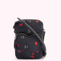 Black crossbody bag with a heart-shaped front pocket, featuring a repeating pattern of red lips and white "L.G." script on a black background.