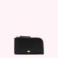 Black leather zip-around cardholder with gold lip detail on a white background.