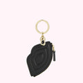 Black quilted leather lip-shaped key chain with gold-toned hardware.