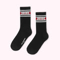 Pair of black Lulu Guinness socks with red heart and logo detail.
