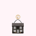 Black house-shaped keyring with white details and gold ring.