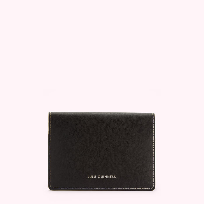 Black Lulu Guinness cardholder with off-white stitching.