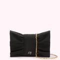 Black bow-shaped clutch with gold chain strap and subtle logo.