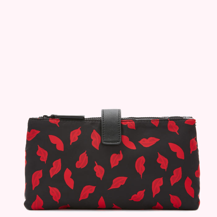 Black cosmetic bag with red lips print.