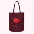 Black tote bag with a red lips pattern and a red lip-shaped pocket.
