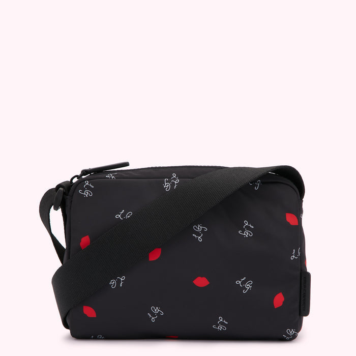 Black crossbody bag with red lips and LG logo print.