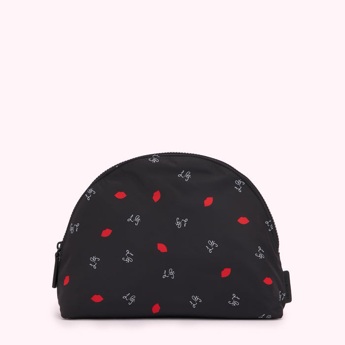 Black half-moon shaped cosmetic bag with a red lips and white L.G. logo pattern.