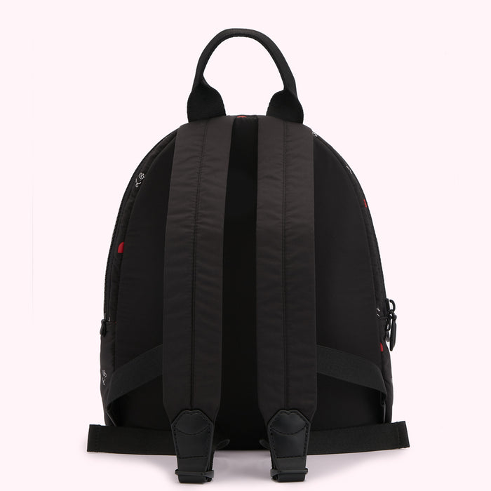 Back view of a black backpack with red and white accents.