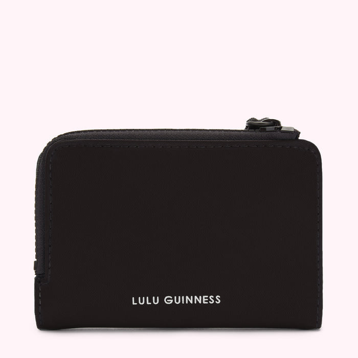 Black Lulu Guinness zip-around wallet against a white background.
