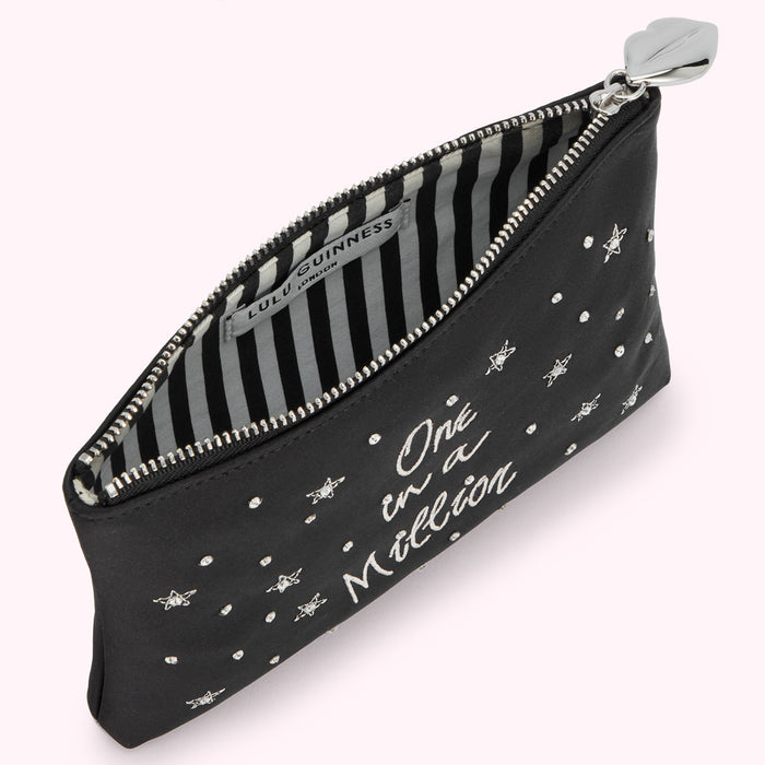 Black Lulu Guinness makeup bag with silver studs, bees and the text "One in a Million".