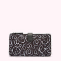 Black pouch with white pearl pattern, black leather strap.