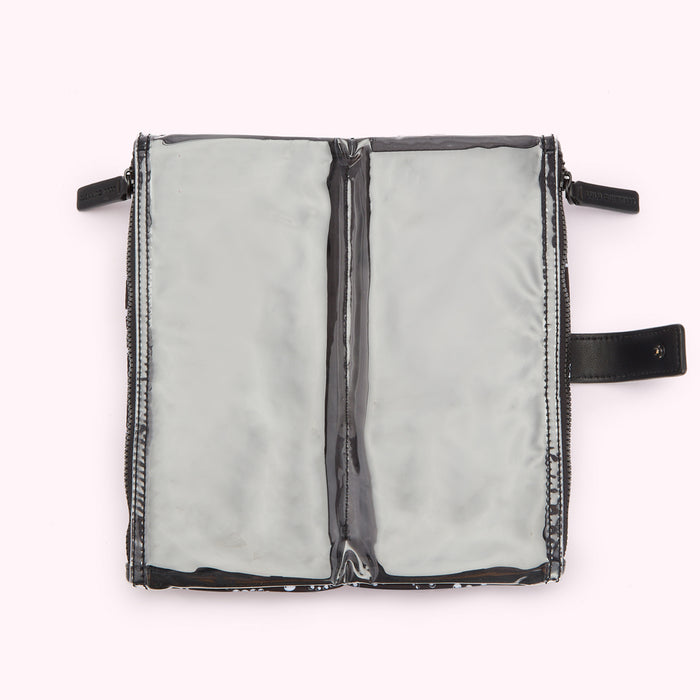 Double zippered clear pouch with black trim on a white background.