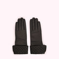 Pair of black leather gloves with quilted cuffs against a white background.