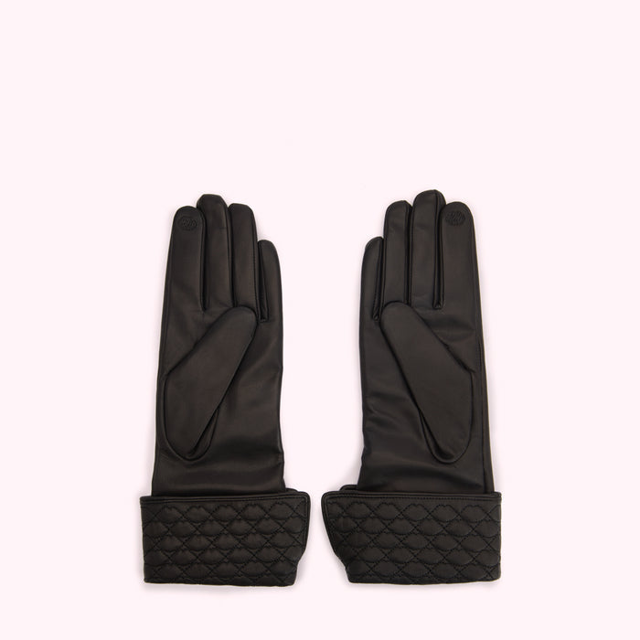 Pair of black leather gloves with quilted cuffs against a white background.