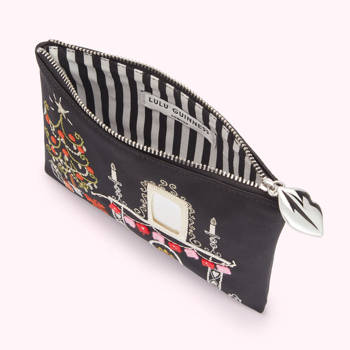 Black Lulu Guinness make-up bag with embroidered Christmas scene and silver zip pull. The inside lining is black and white striped.